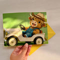 Highland Cow Retro Car Greeting Card – Blank Grassland Scene (9x14cm)