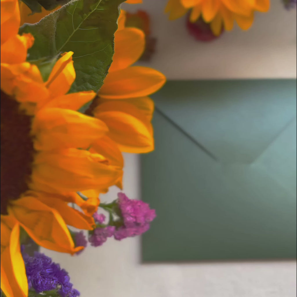 3D pop up greeting card featuring a smiling dog wearing a straw hat surrounded by bright sunflowers, cute handmade paper sculpture, cheerful and heartwarming design